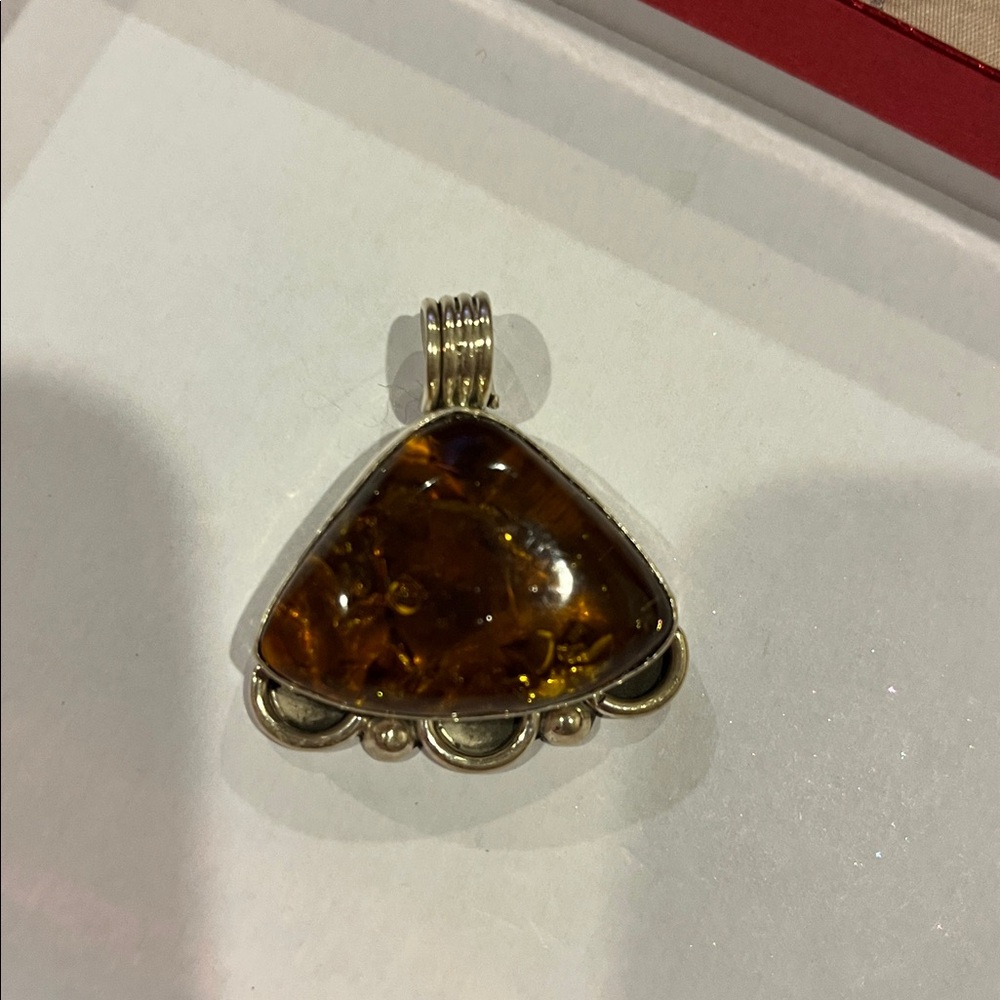 Triangular Amber Pendant With Silver Detailing - image 4